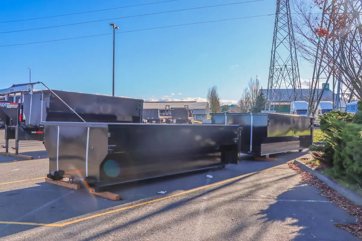 Roll-off dumpster ready for waste disposal at job site for 2 Yard Dumpster Rental in Winchendon